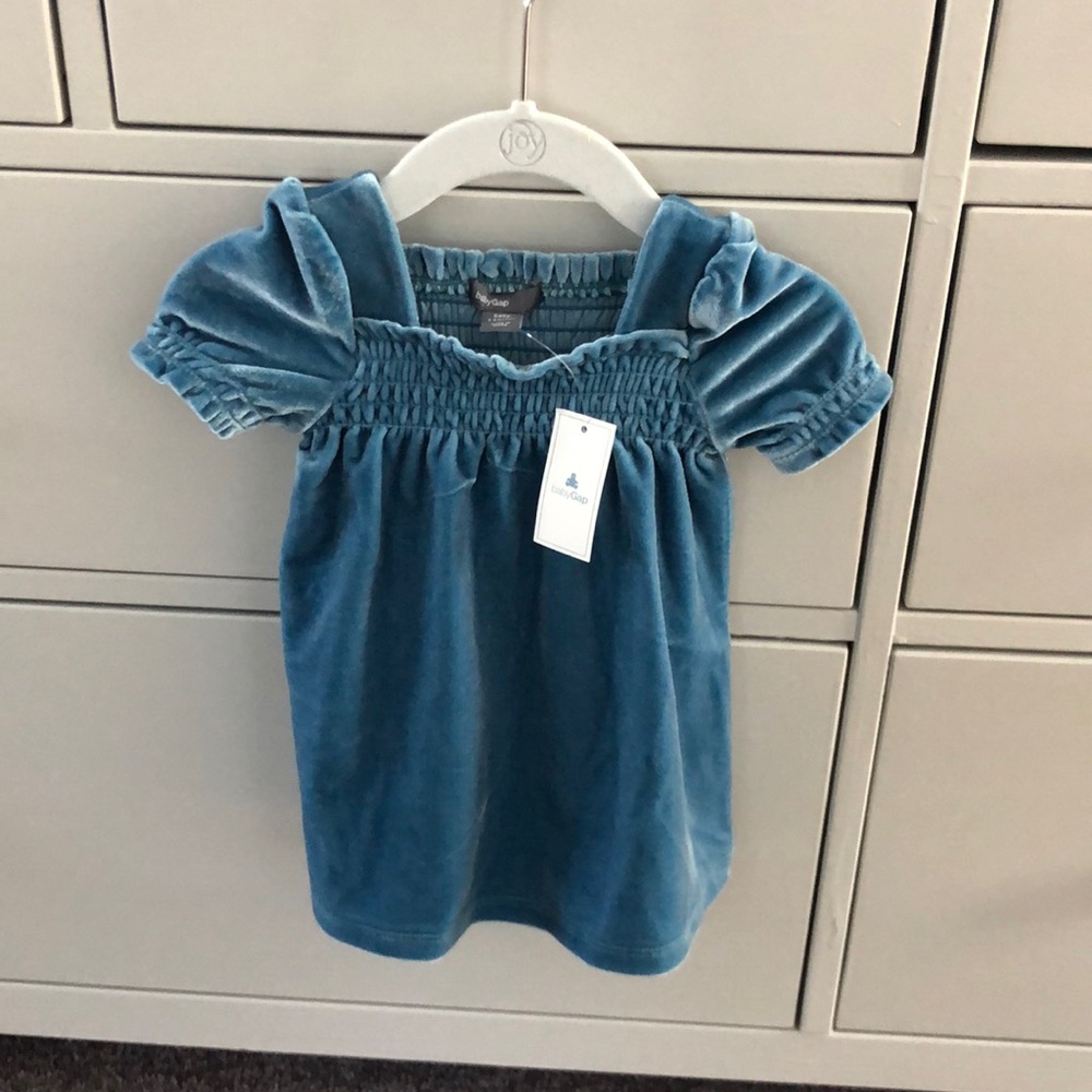Baby Gap blue velvet dress. New with tags. Size 3-6 months.